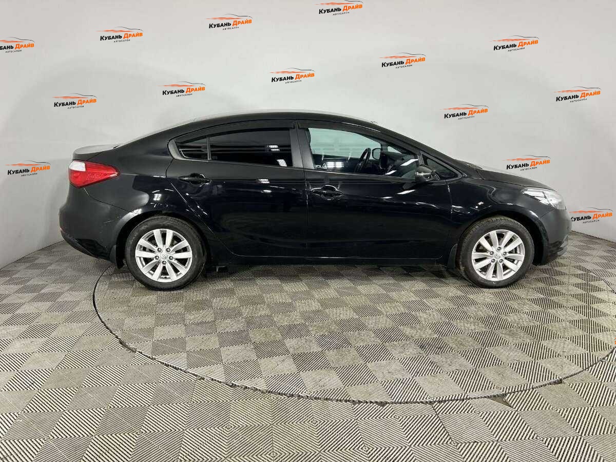 Kia Cerato 2014 года с пробегом. Фото: #3