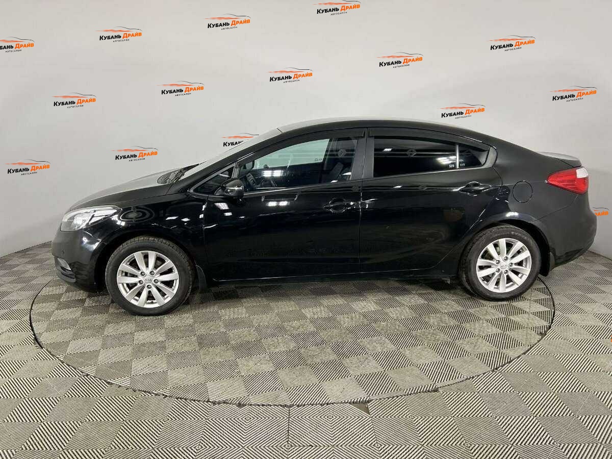 Kia Cerato 2014 года с пробегом. Фото: #4