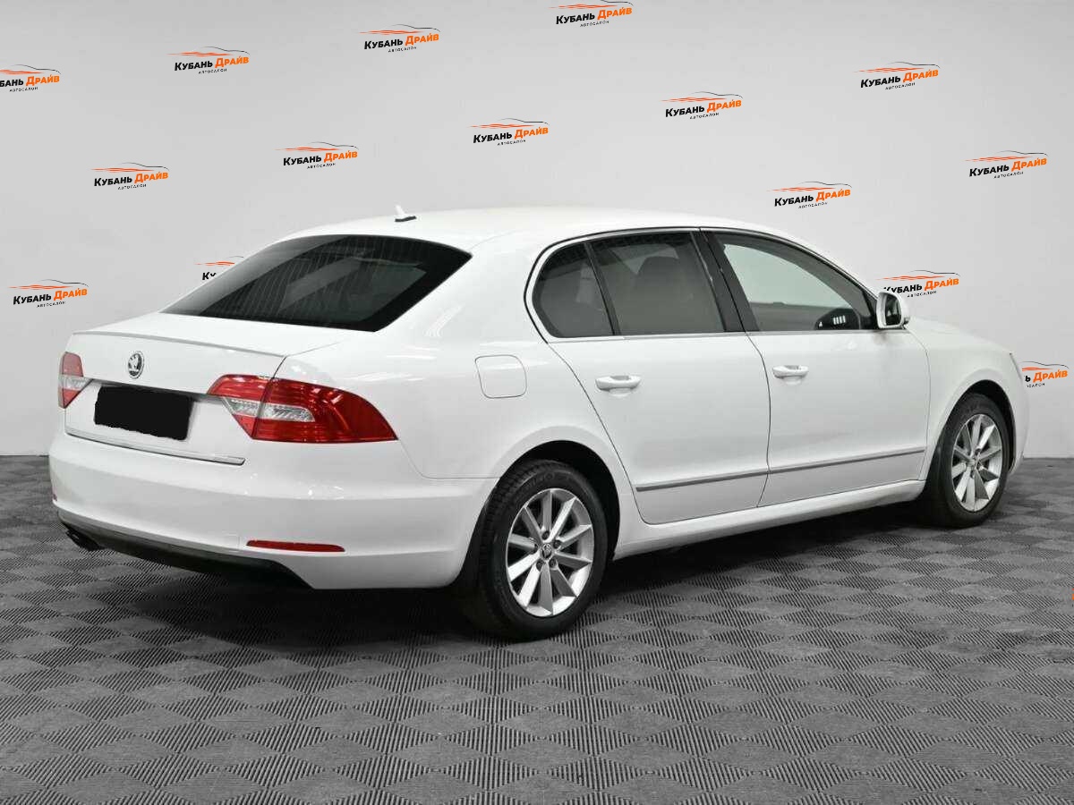 Skoda Superb 2013 года с пробегом. Фото: #1