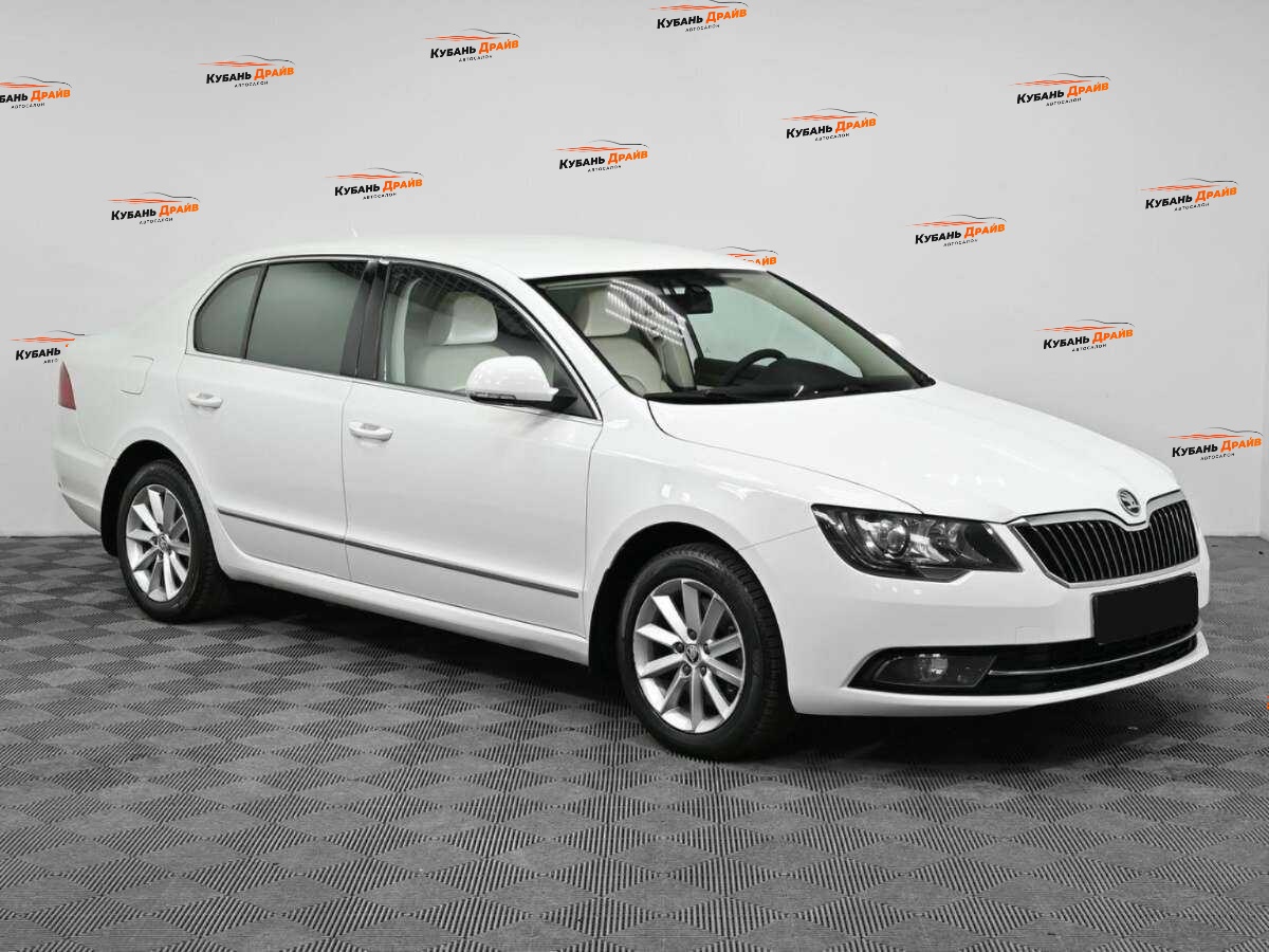 Skoda Superb 2013 года с пробегом. Фото: #2