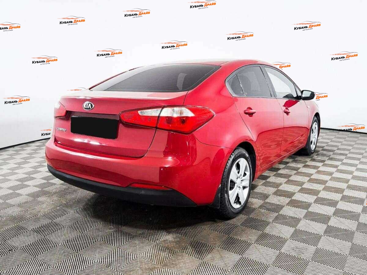 Kia Cerato 2013 года с пробегом. Фото: #3