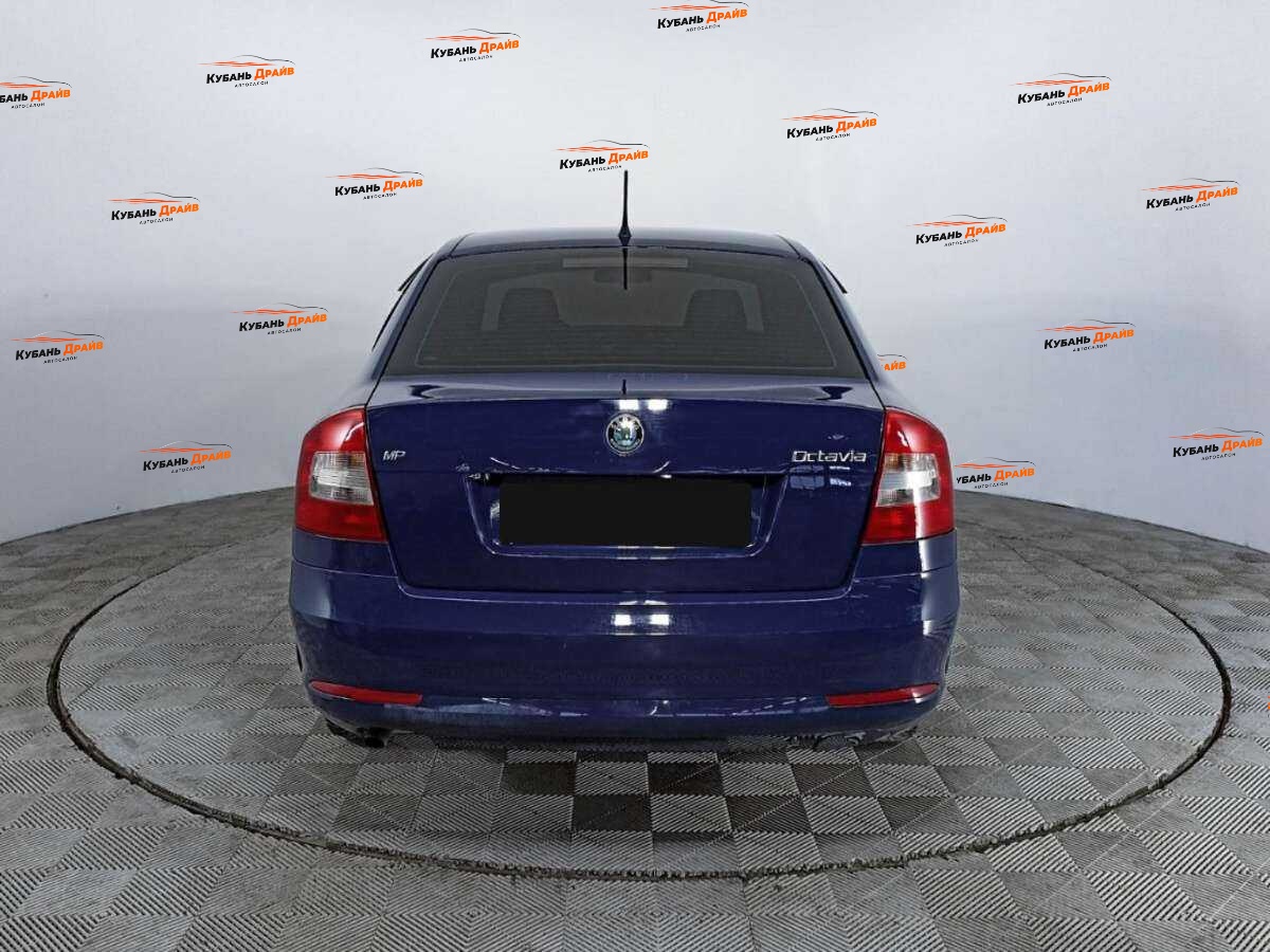 Skoda Octavia 2012 года с пробегом. Фото: #4