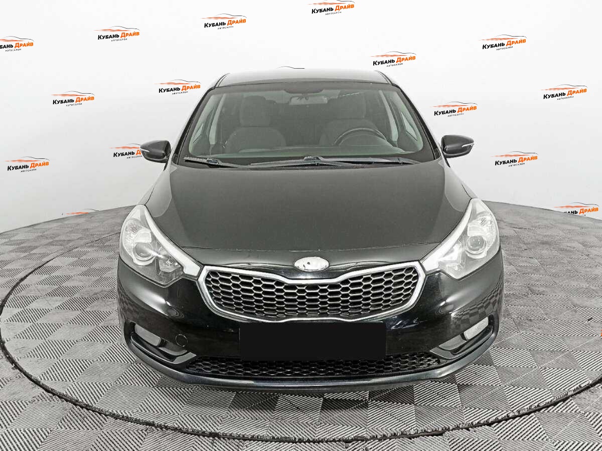 Kia Cerato 2013 года с пробегом. Фото: #1
