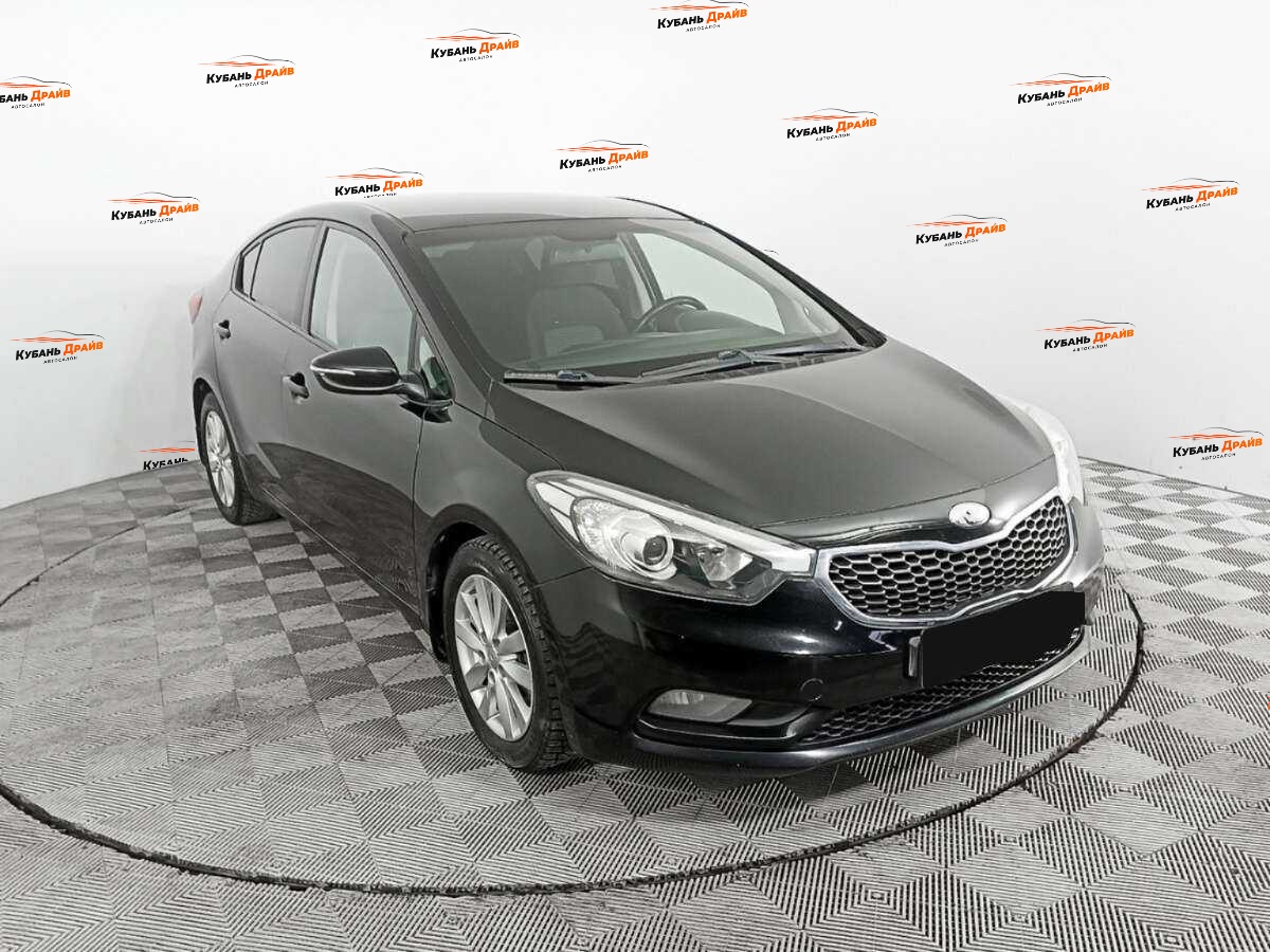 Kia Cerato 2013 года с пробегом. Фото: #2