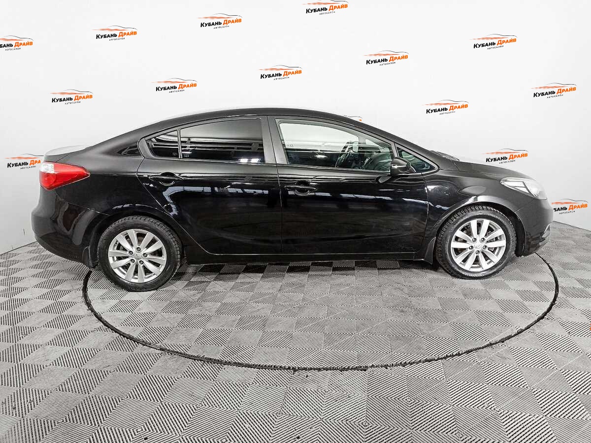 Kia Cerato 2013 года с пробегом. Фото: #3