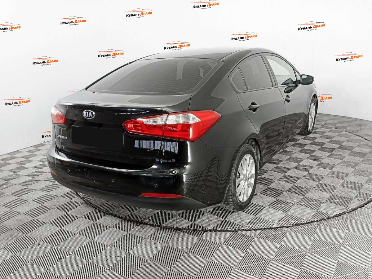 Kia Cerato 2013 года с пробегом. Фото: #4