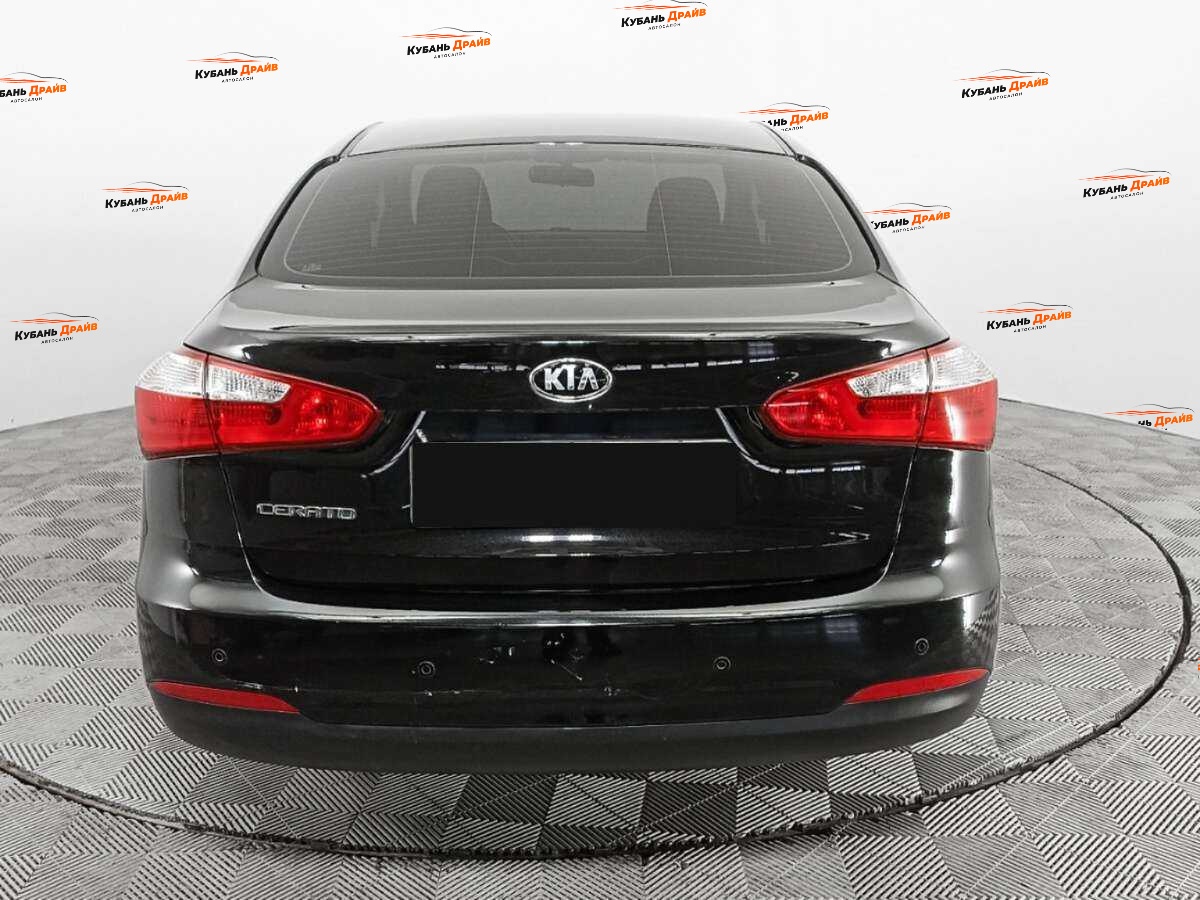 Kia Cerato 2013 года с пробегом. Фото: #5