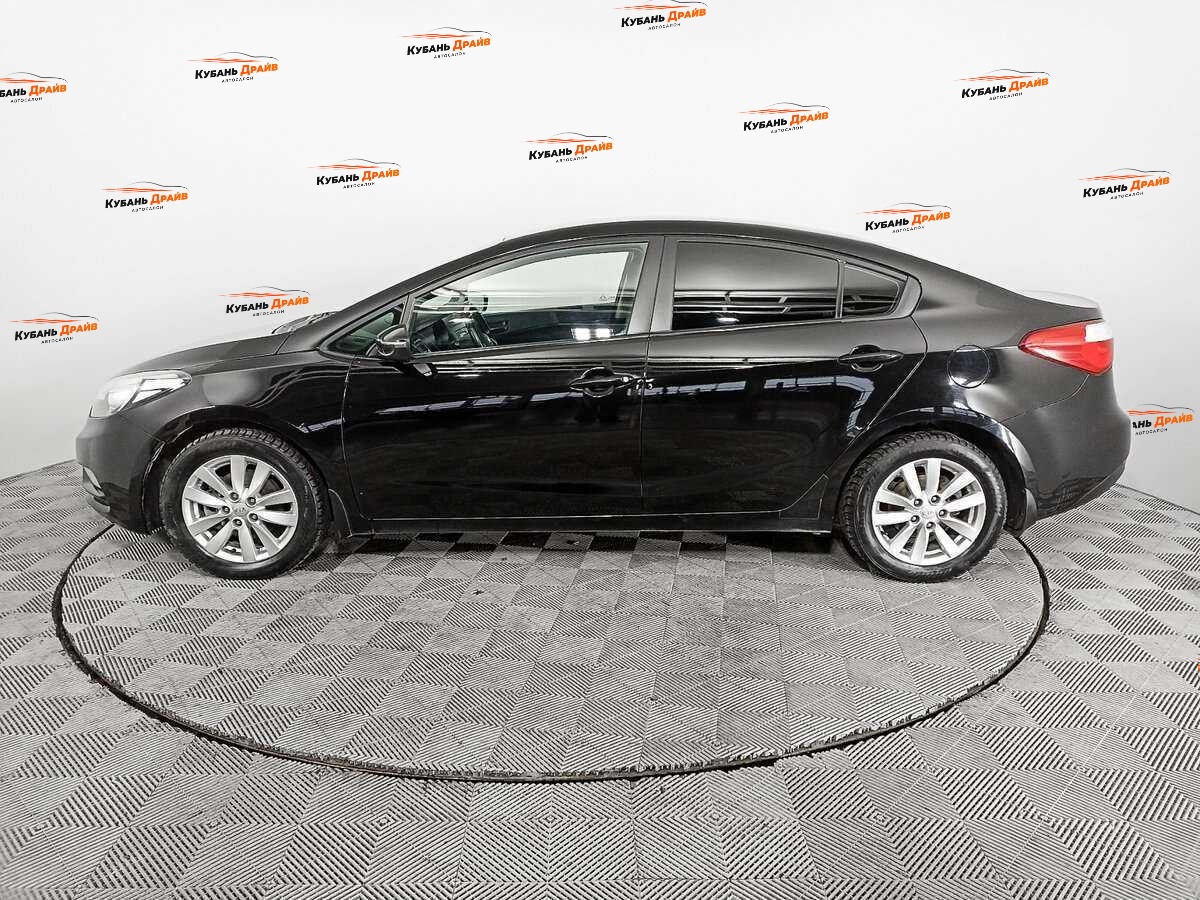 Kia Cerato 2013 года с пробегом. Фото: #7