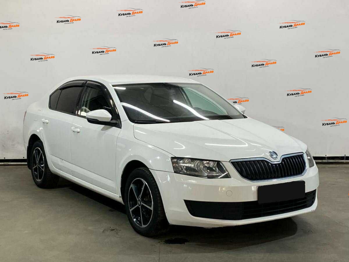 Skoda Octavia 2013 года с пробегом. Фото: #2