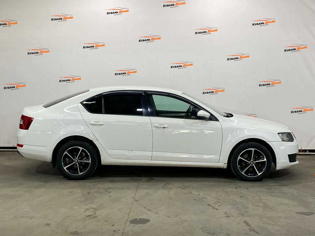 Skoda Octavia 2013 года с пробегом. Фото: #3