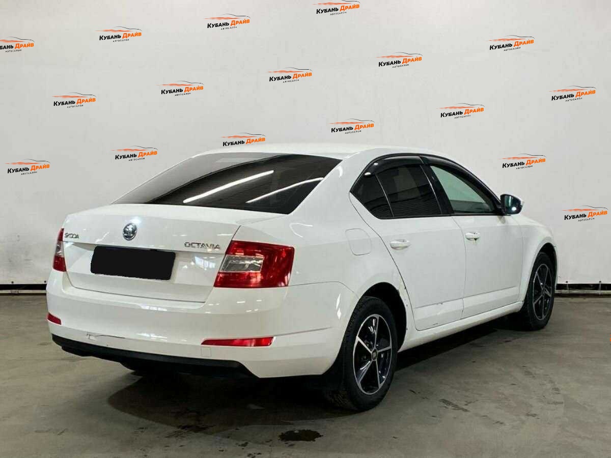 Skoda Octavia 2013 года с пробегом. Фото: #4