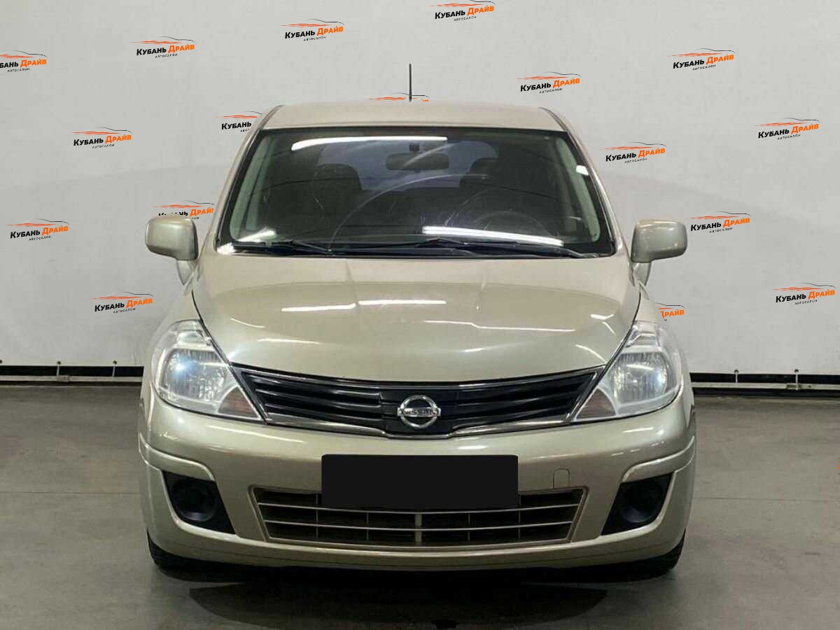 Nissan Tiida 2013 года с пробегом. Фото: #1