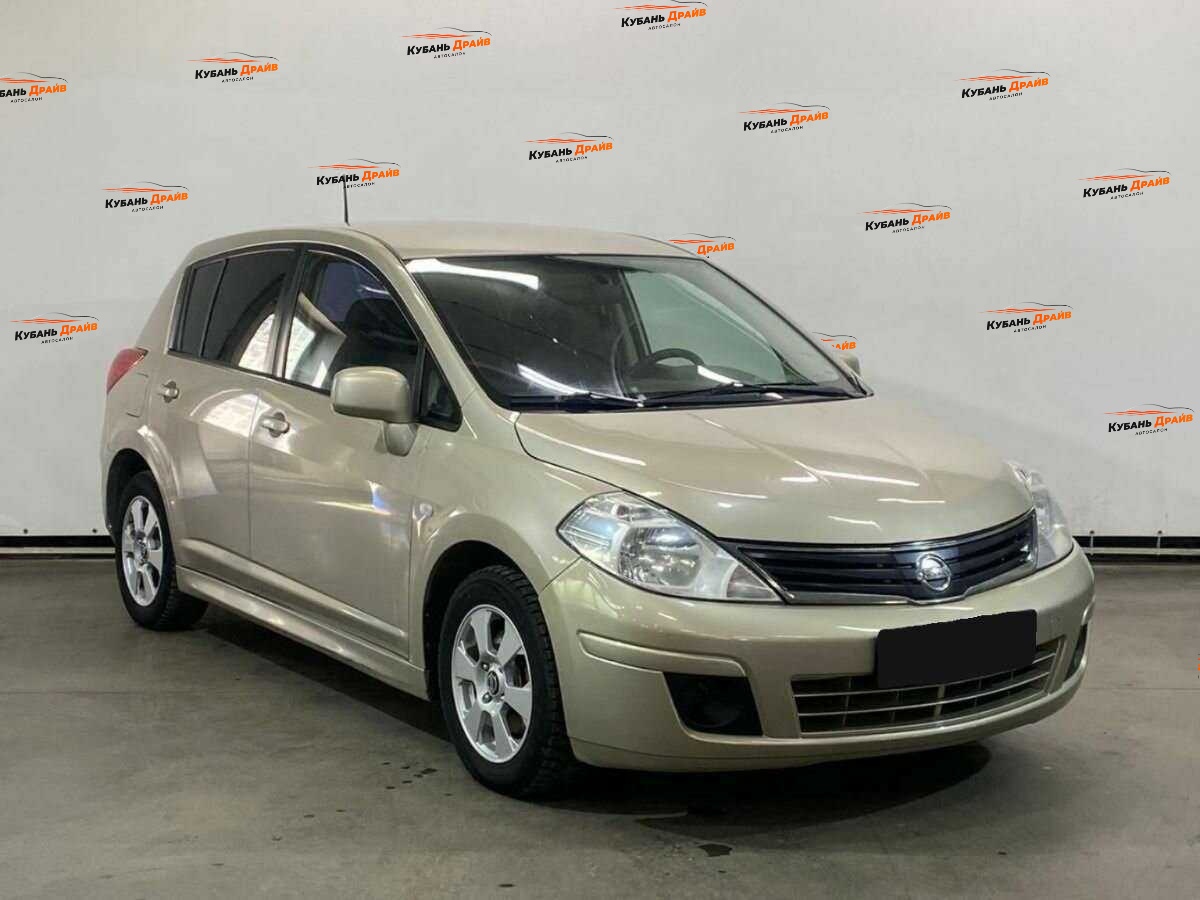 Nissan Tiida 2013 года с пробегом. Фото: #2