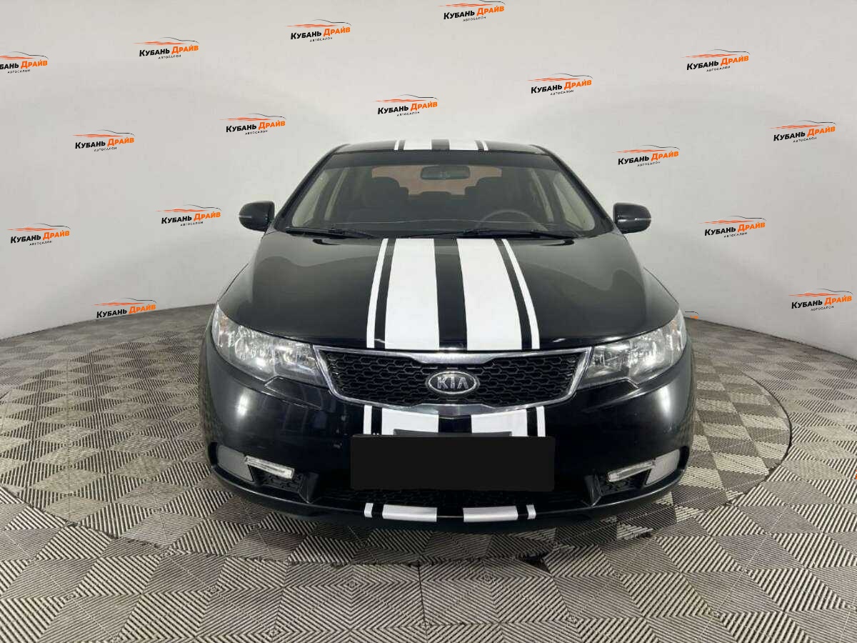 Kia Cerato 2013 года с пробегом. Фото: #1