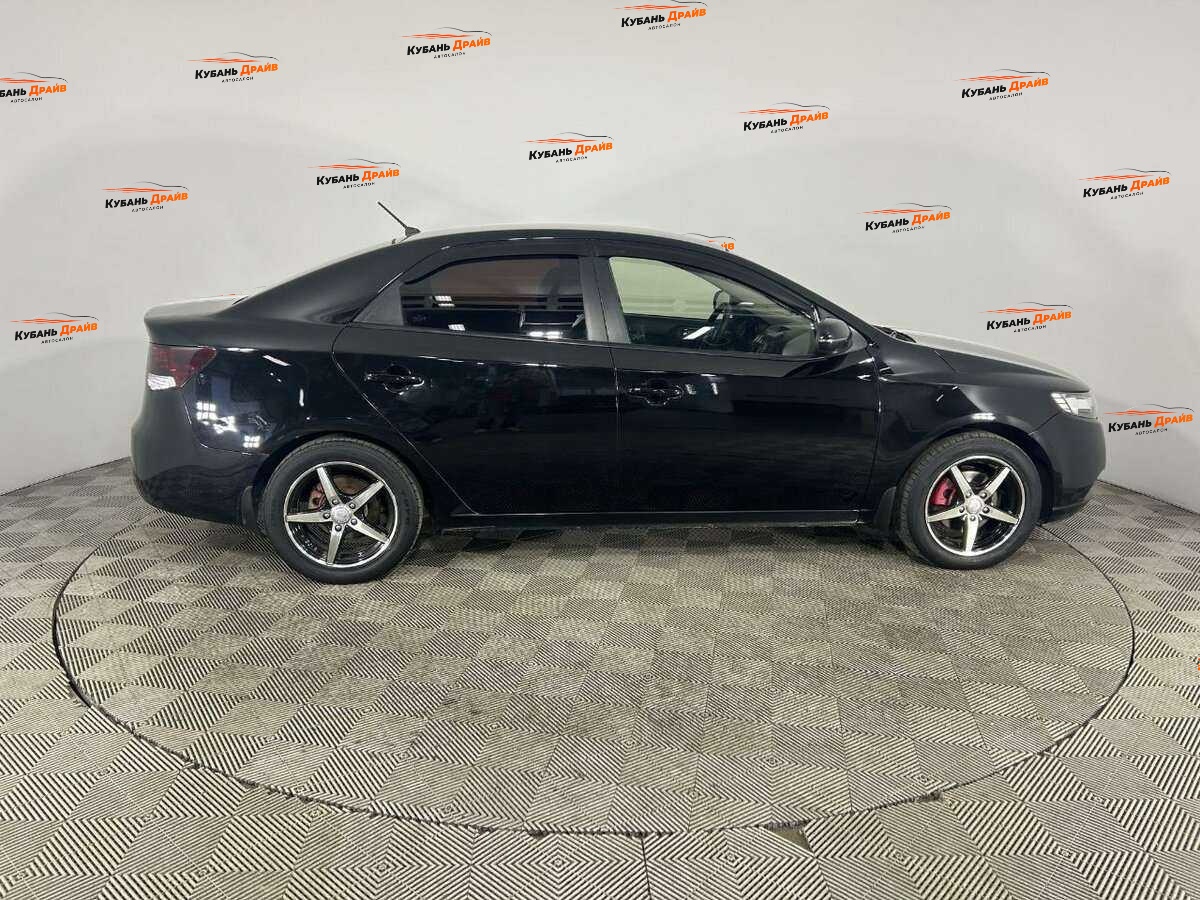 Kia Cerato 2013 года с пробегом. Фото: #2