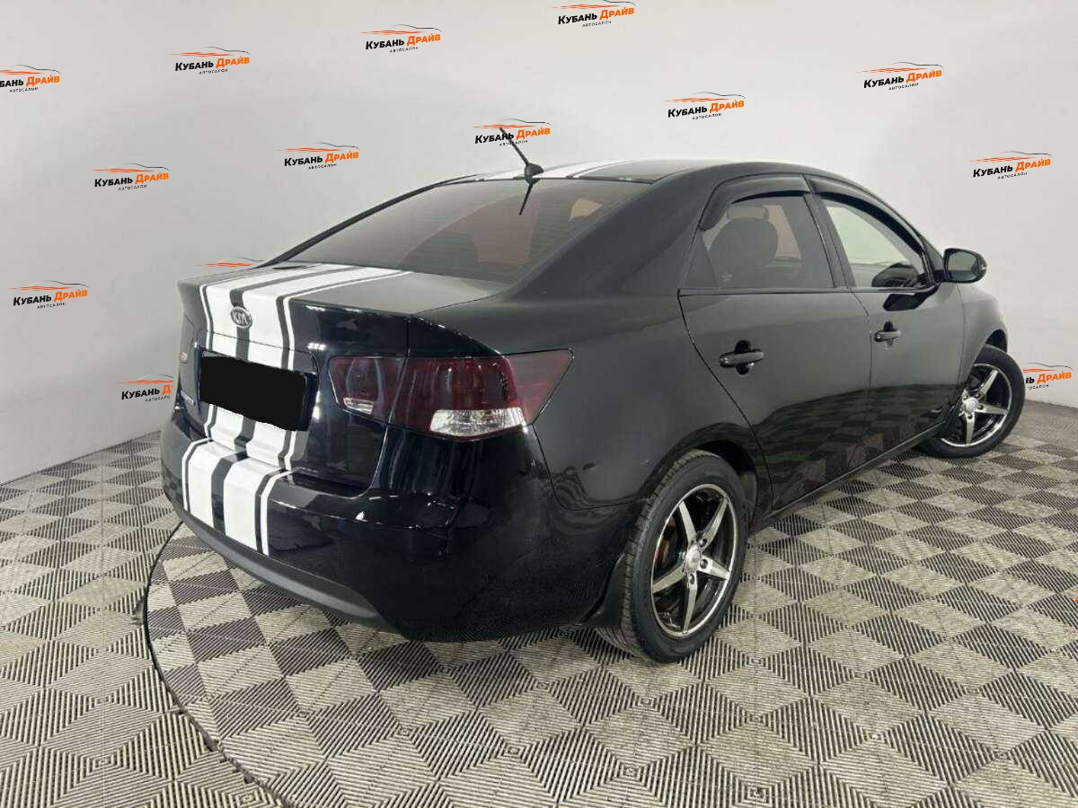 Kia Cerato 2013 года с пробегом. Фото: #3