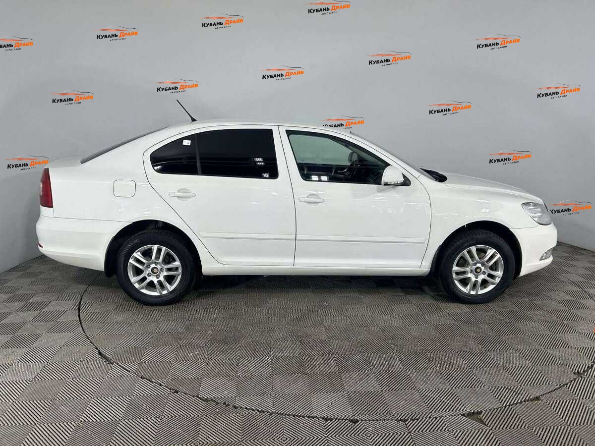 Skoda Octavia 2012 года с пробегом. Фото: #3
