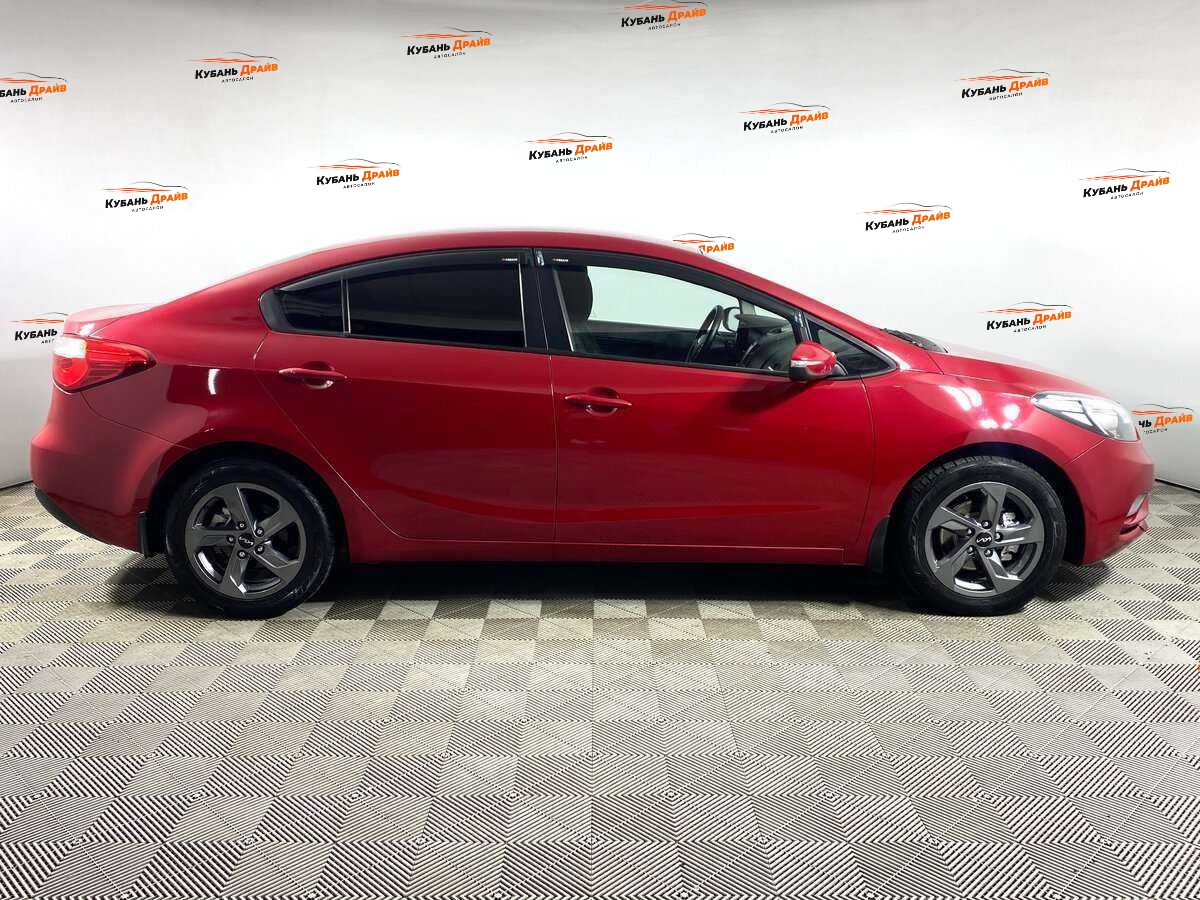 Kia Cerato 2013 года с пробегом. Фото: #2