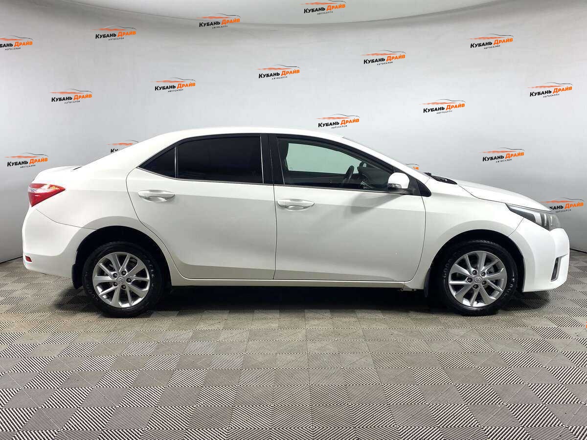 Toyota Corolla 2013 года с пробегом. Фото: #3