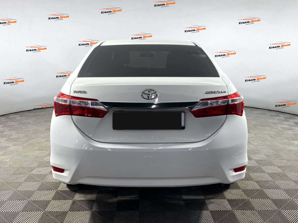 Toyota Corolla 2013 года с пробегом. Фото: #5