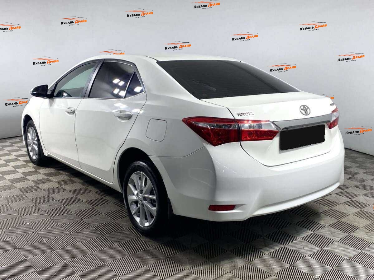 Toyota Corolla 2013 года с пробегом. Фото: #6