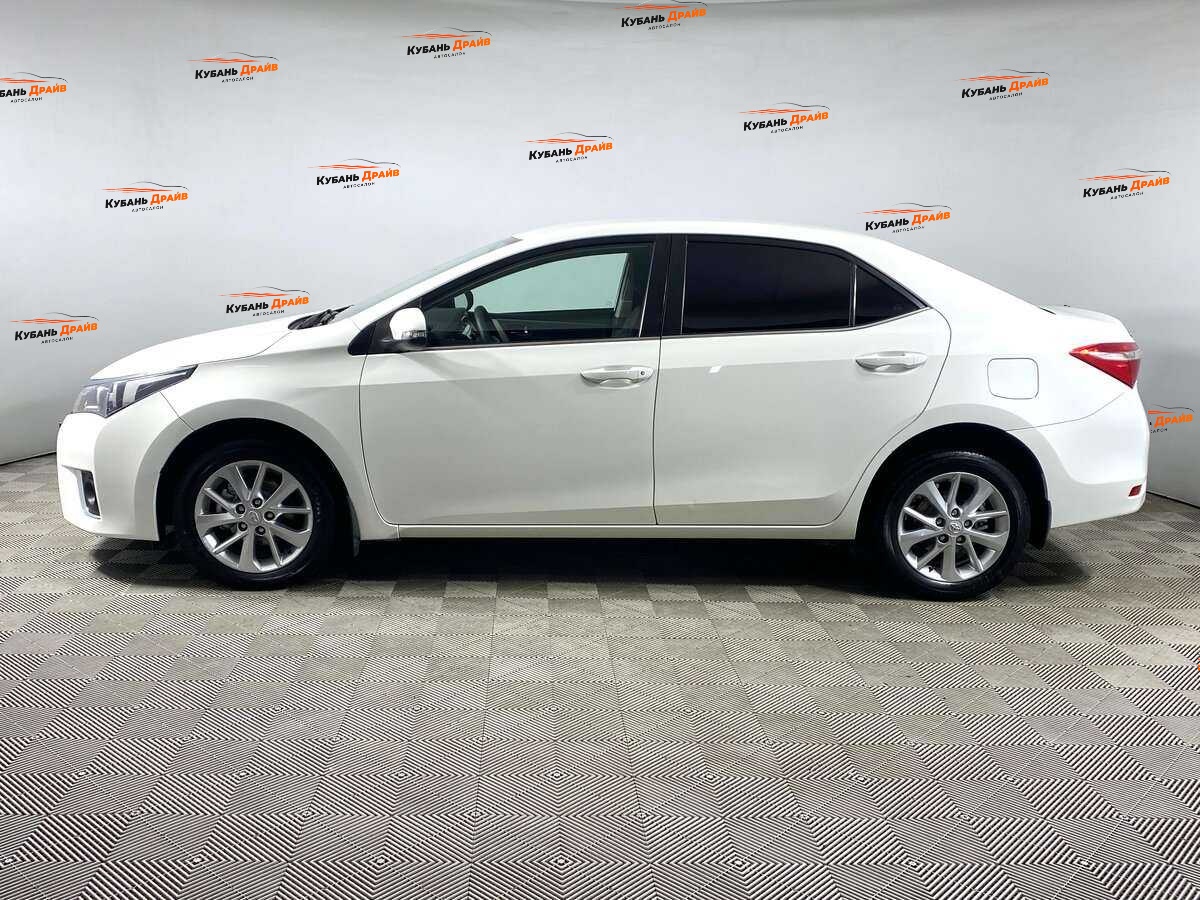 Toyota Corolla 2013 года с пробегом. Фото: #7