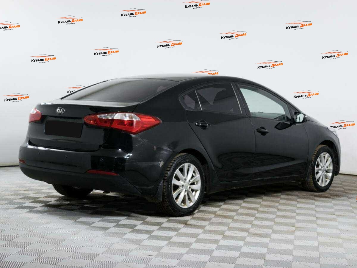 Kia Cerato 2014 года с пробегом. Фото: #4