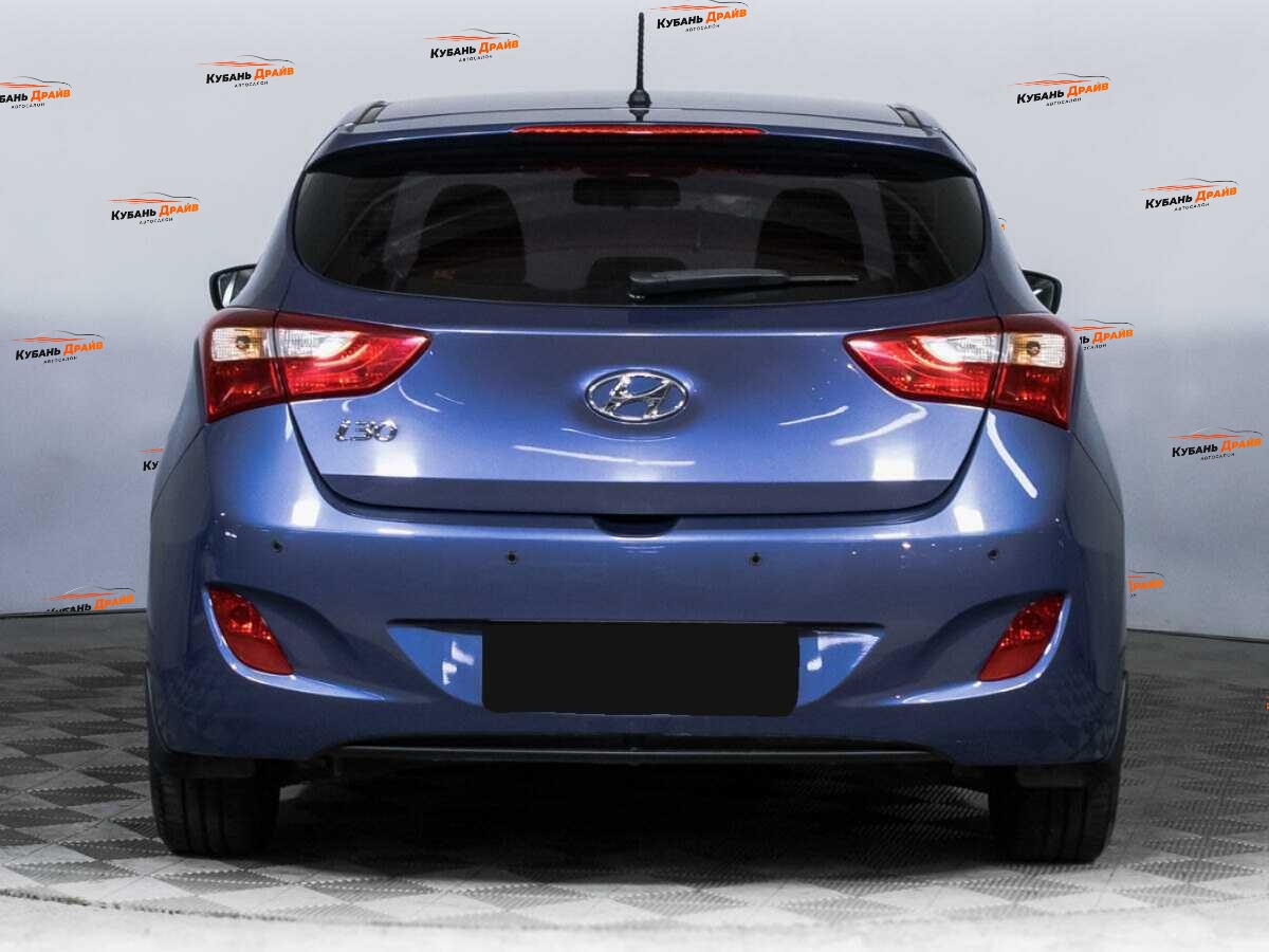 Hyundai i30 2014 года с пробегом. Фото: #5