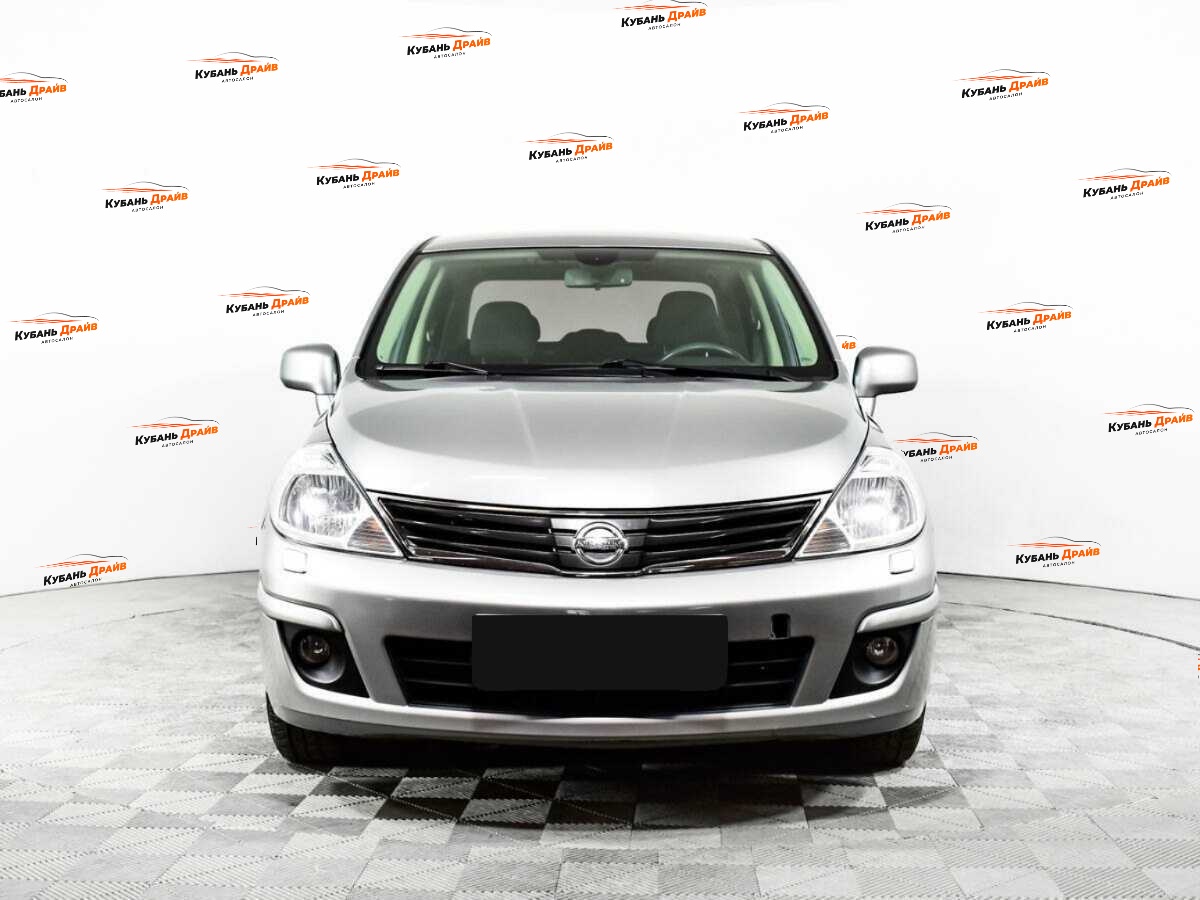Nissan Tiida 2013 года с пробегом. Фото: #1