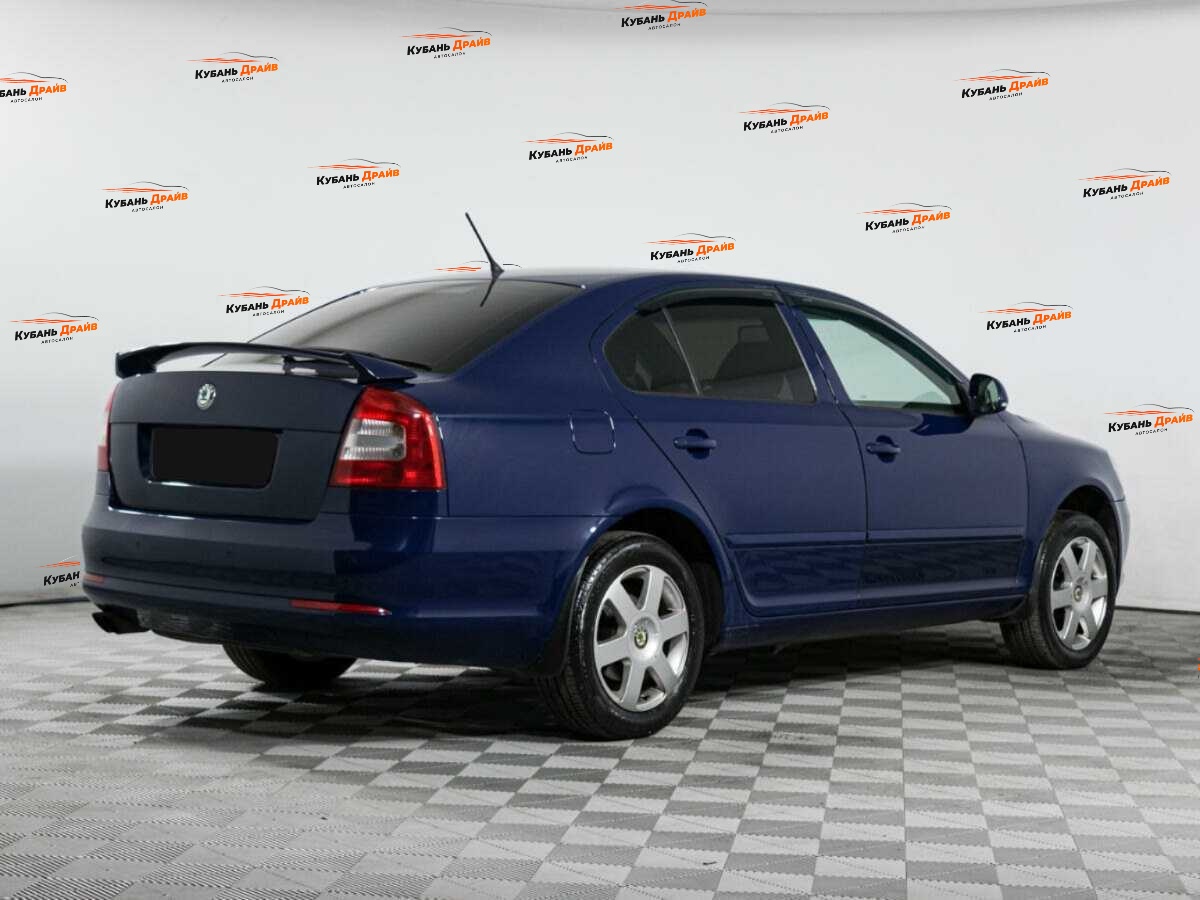 Skoda Octavia 2012 года с пробегом. Фото: #4
