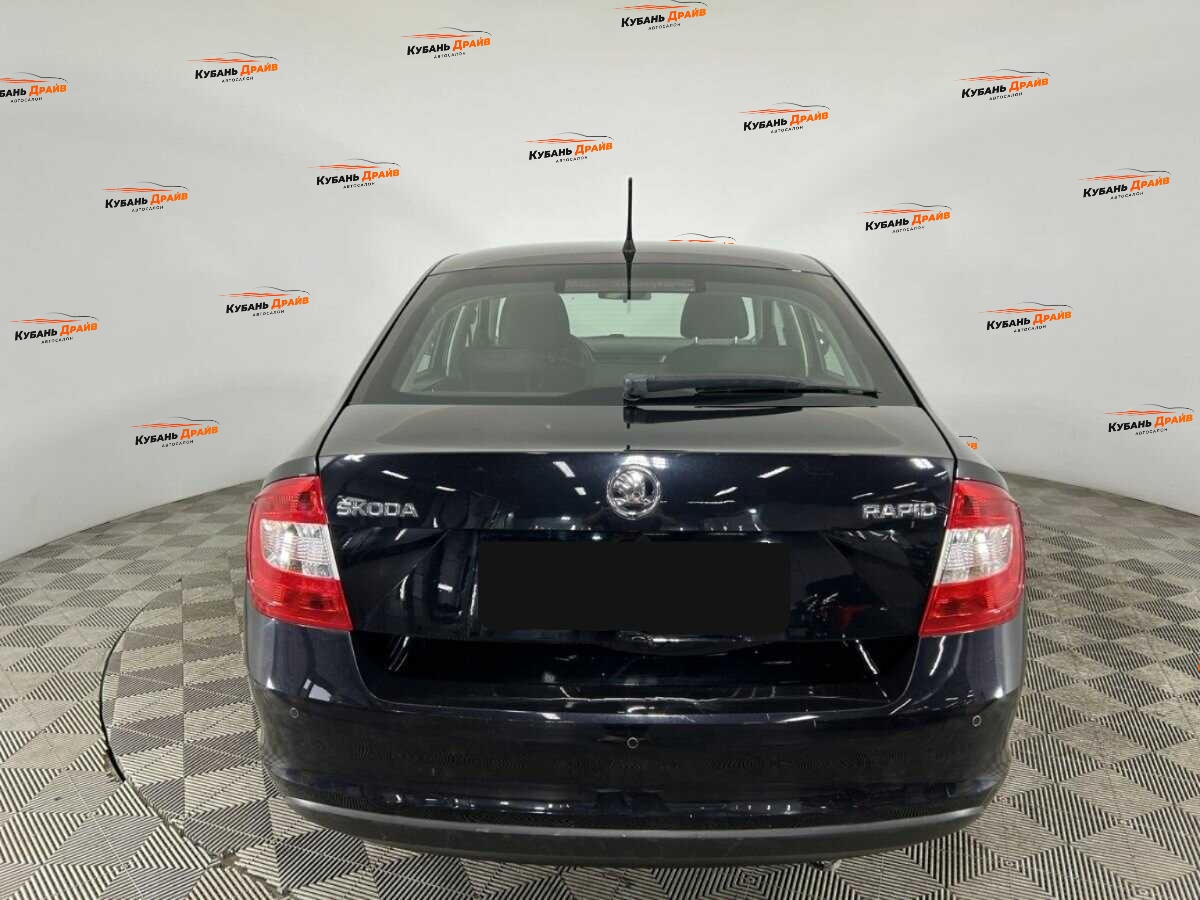 Skoda Rapid 2014 года с пробегом. Фото: #2