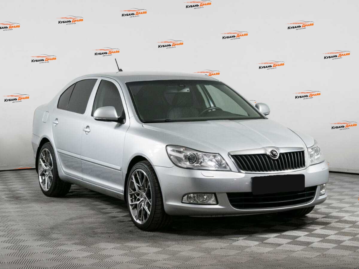 Skoda Octavia 2013 года с пробегом. Фото: #2