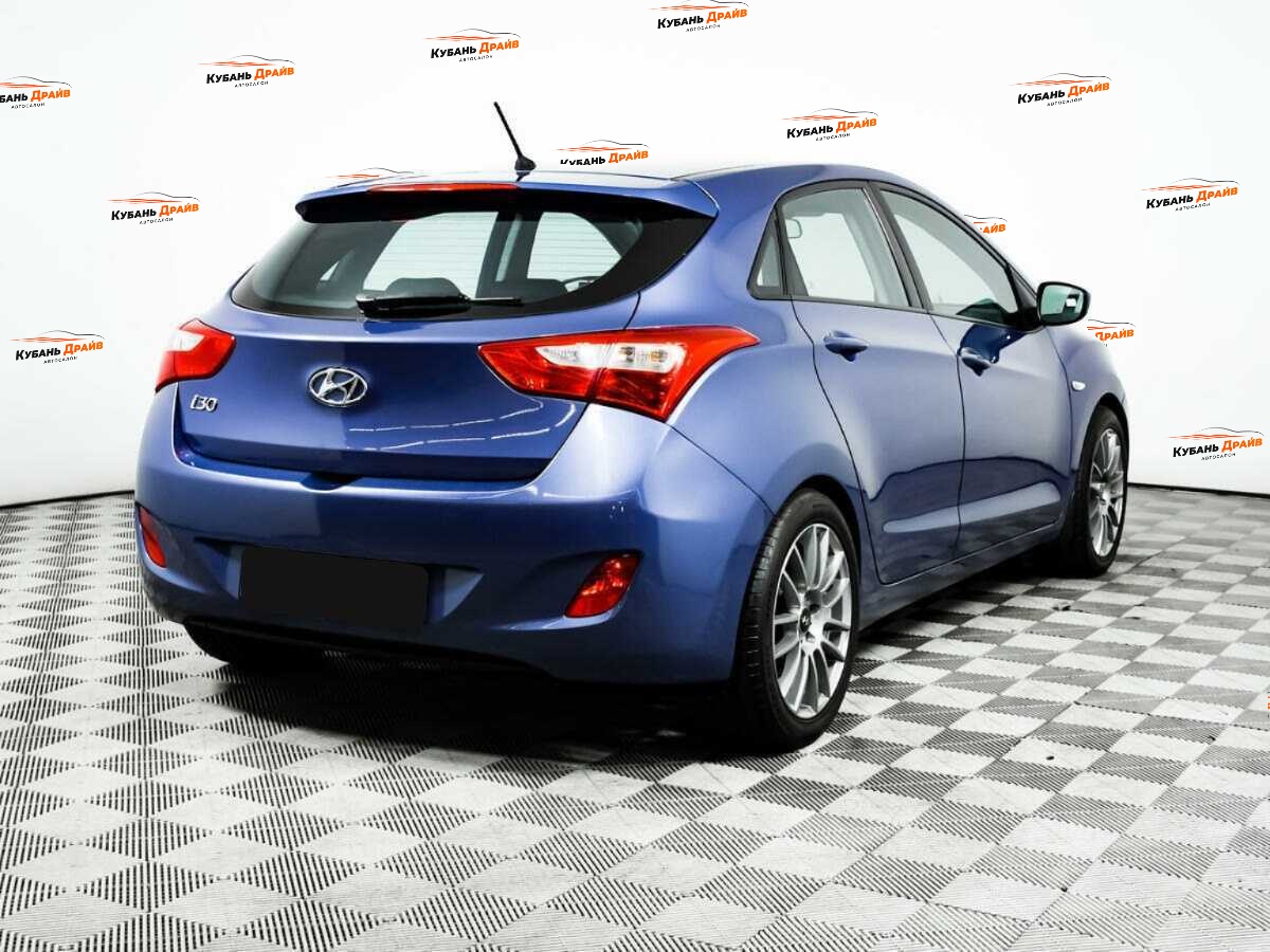 Hyundai i30 2014 года с пробегом. Фото: #4
