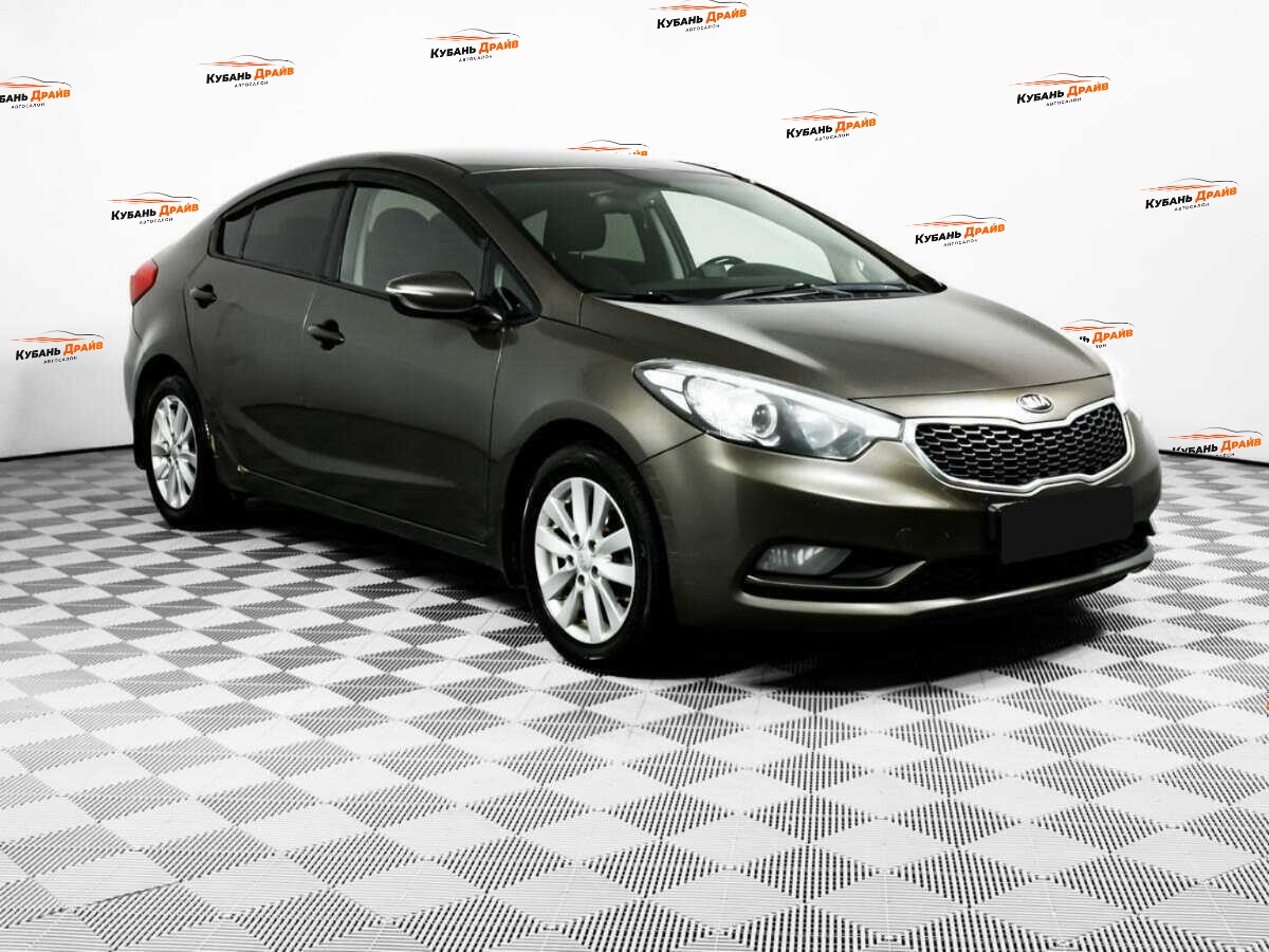 Kia Cerato 2014 года с пробегом. Фото: #2