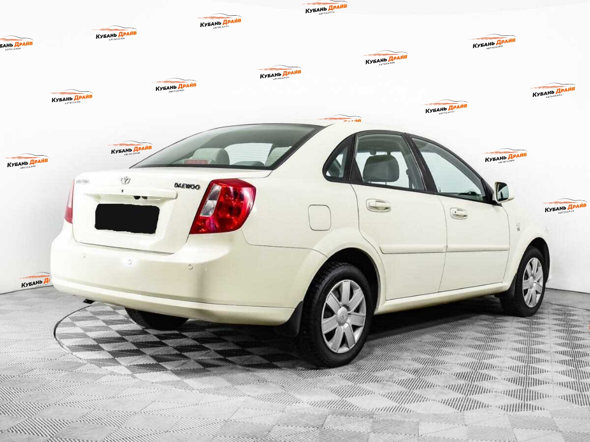 Daewoo Gentra 2014 года с пробегом. Фото: #4