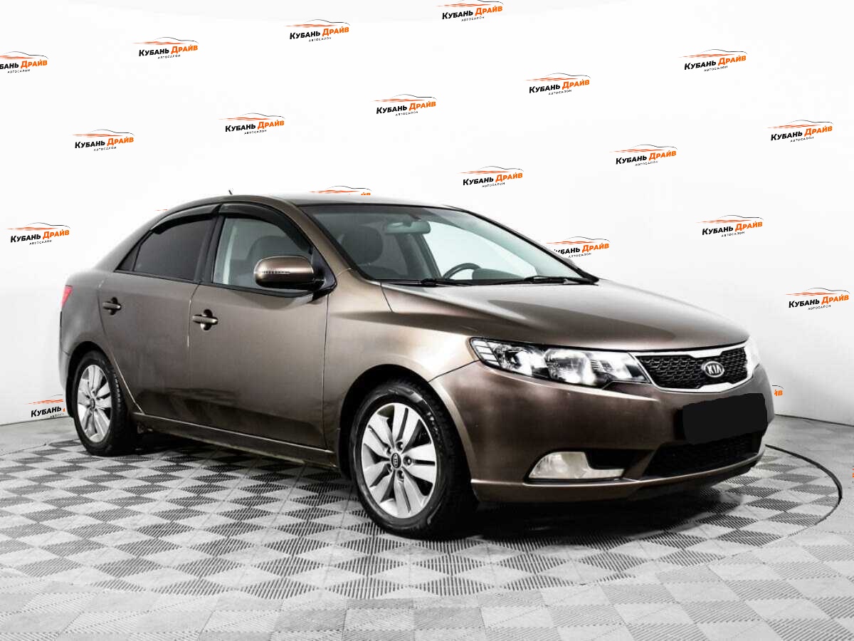 Kia Cerato 2012 года с пробегом. Фото: #2