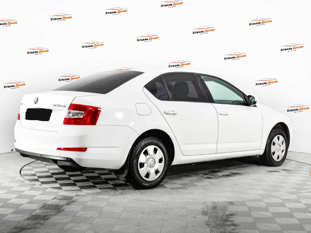 Skoda Octavia 2014 года с пробегом. Фото: #4