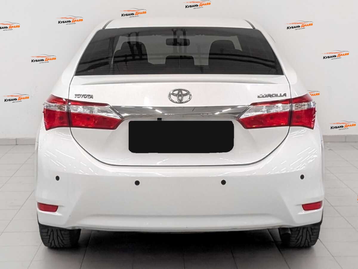 Toyota Corolla 2014 года с пробегом. Фото: #5