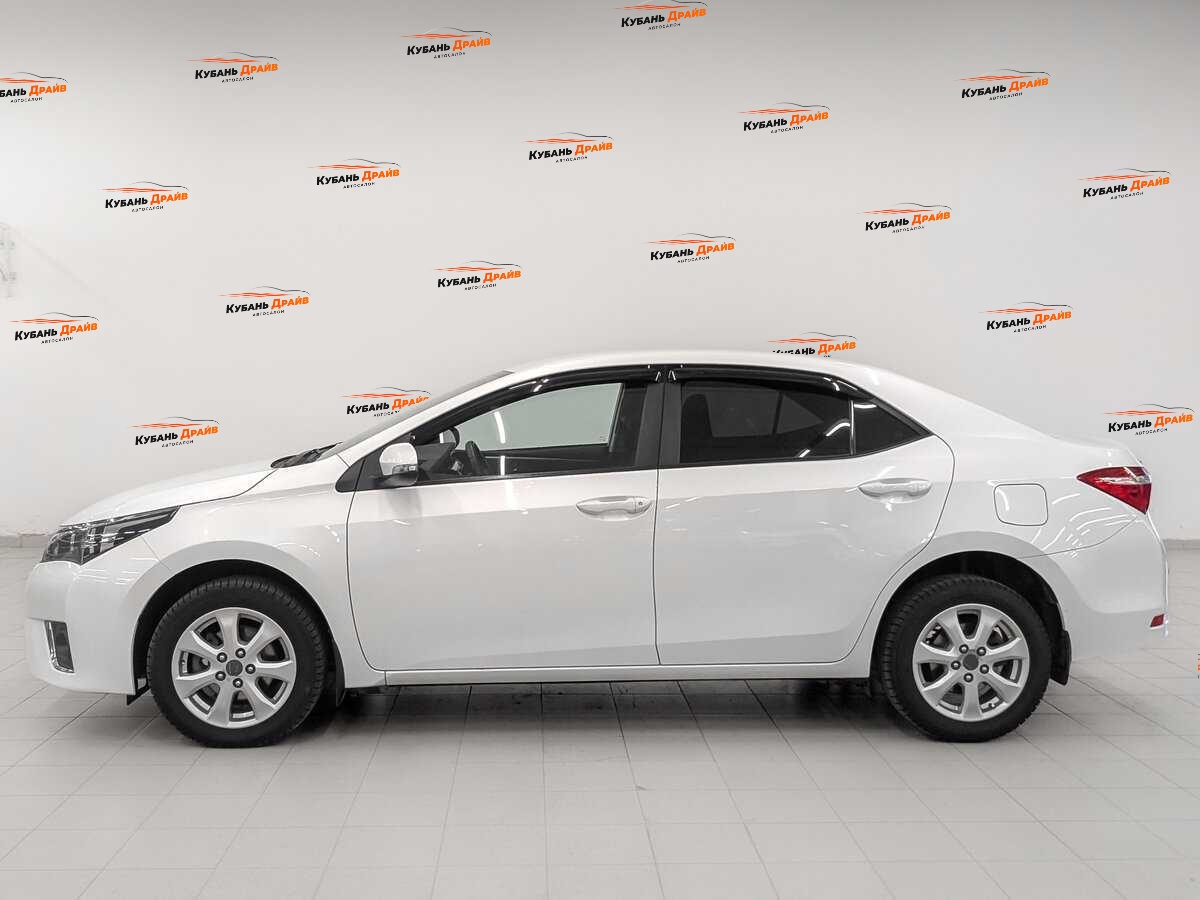 Toyota Corolla 2014 года с пробегом. Фото: #7