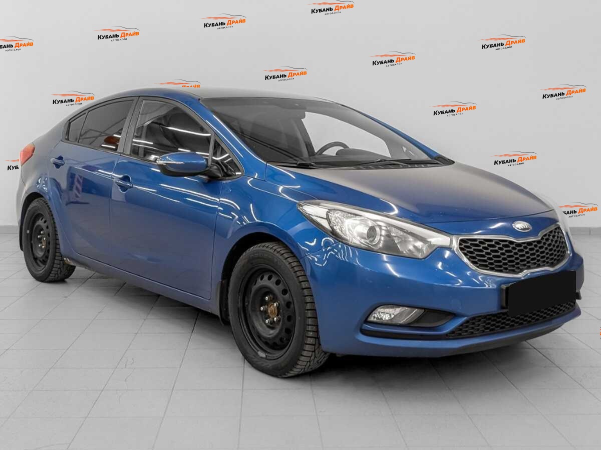 Kia Cerato 2013 года с пробегом. Фото: #2