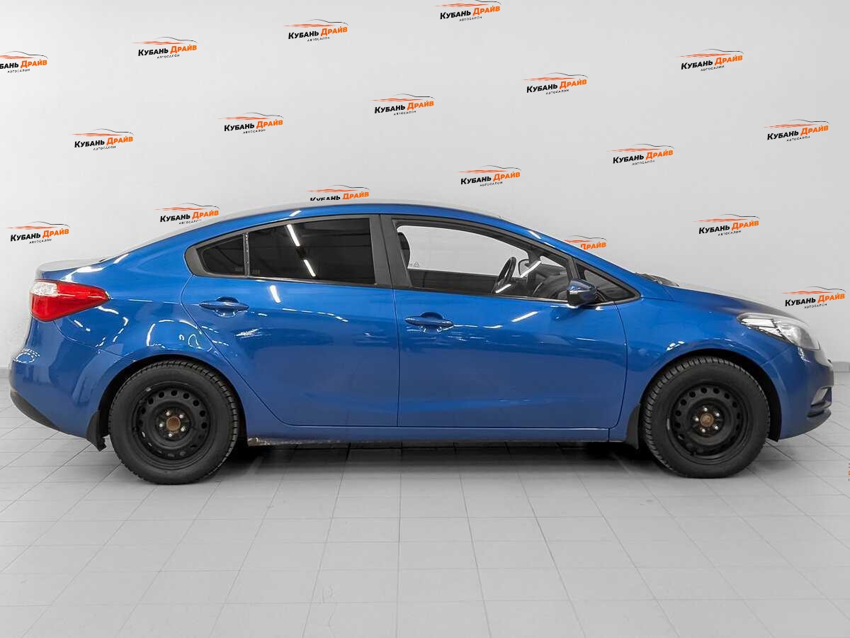 Kia Cerato 2013 года с пробегом. Фото: #3