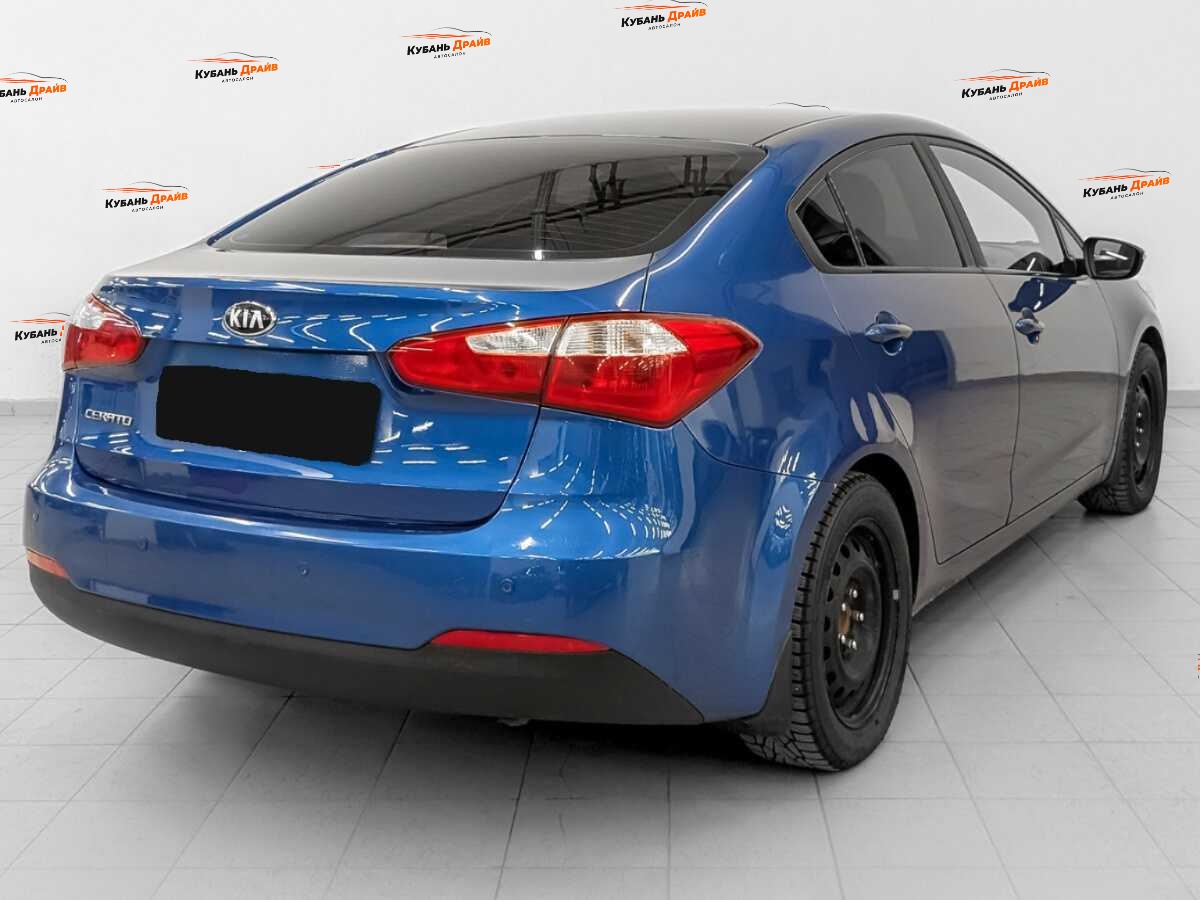 Kia Cerato 2013 года с пробегом. Фото: #4