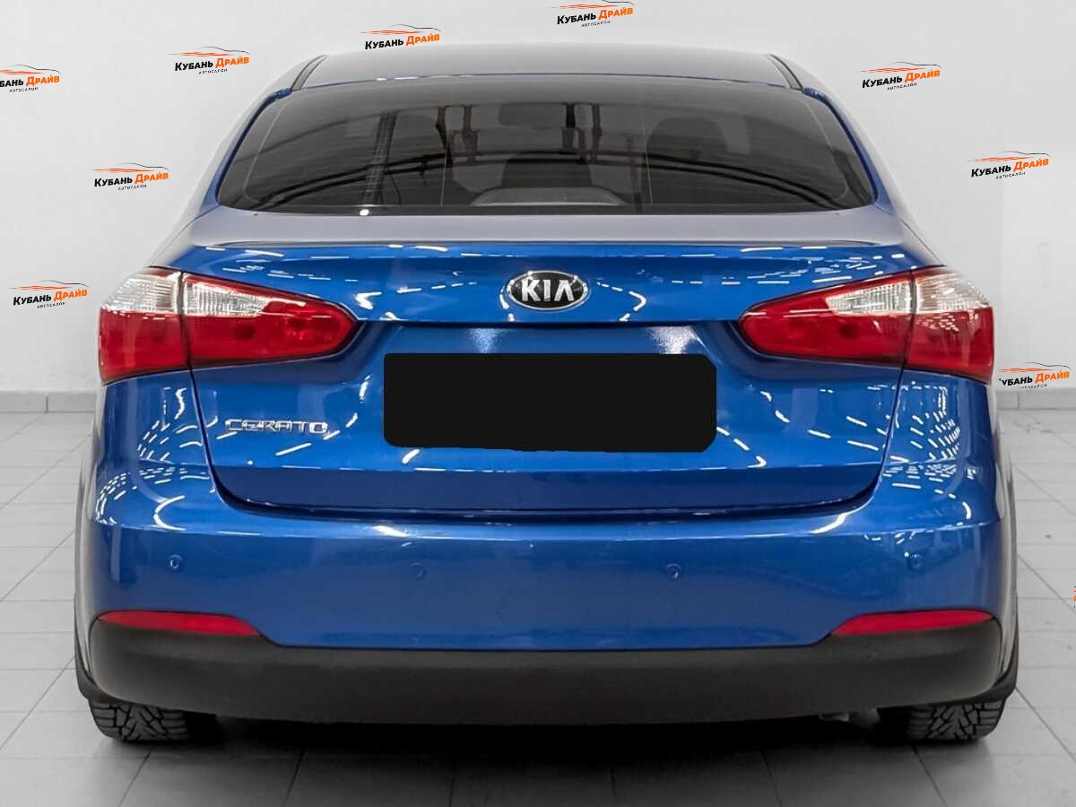 Kia Cerato 2013 года с пробегом. Фото: #5