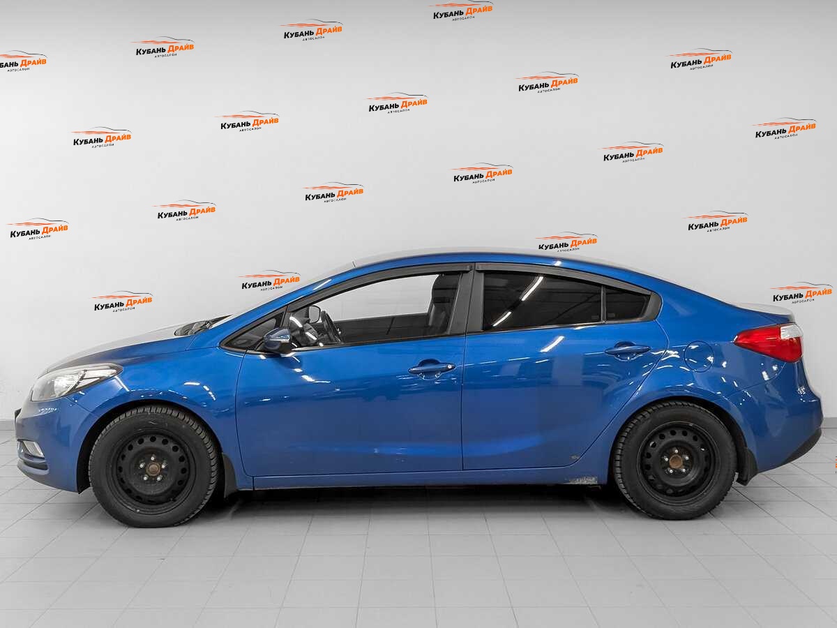 Kia Cerato 2013 года с пробегом. Фото: #7