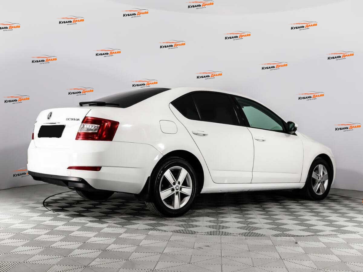Skoda Octavia 2013 года с пробегом. Фото: #4
