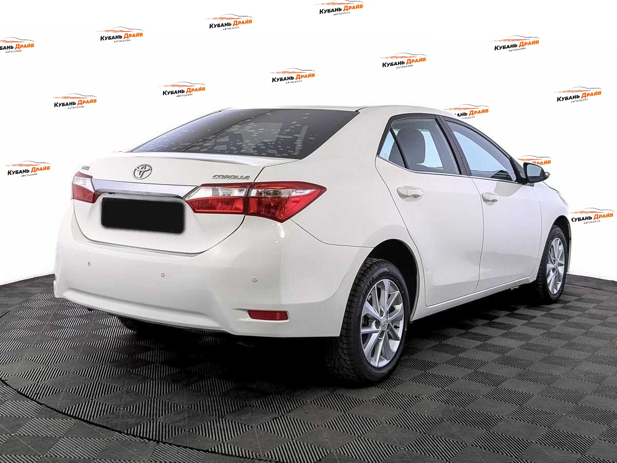 Toyota Corolla 2014 года с пробегом. Фото: #4