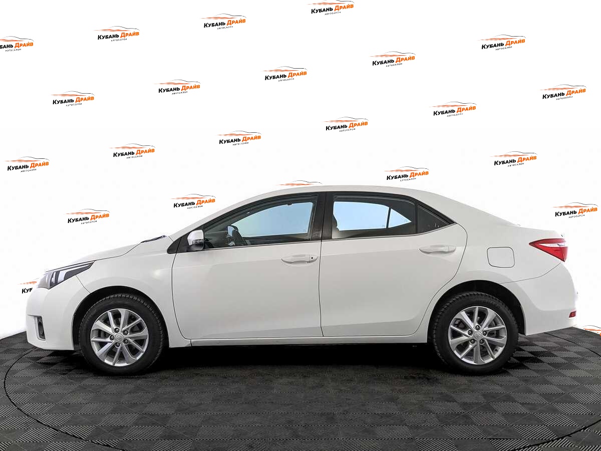 Toyota Corolla 2014 года с пробегом. Фото: #7