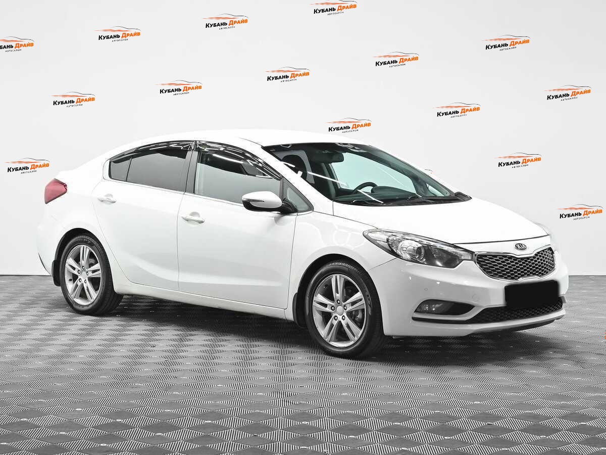 Kia Cerato 2013 года с пробегом. Фото: #1