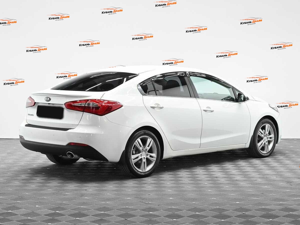 Kia Cerato 2013 года с пробегом. Фото: #2
