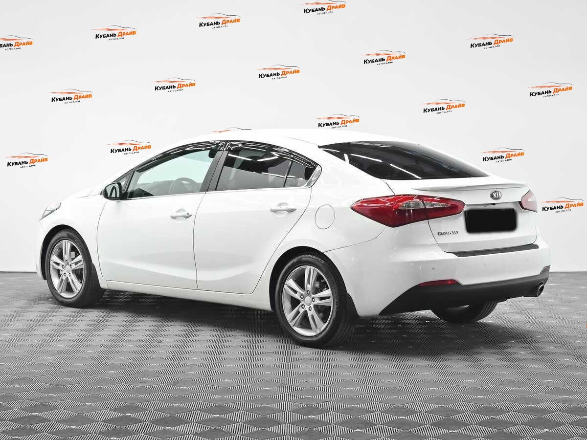Kia Cerato 2013 года с пробегом. Фото: #3
